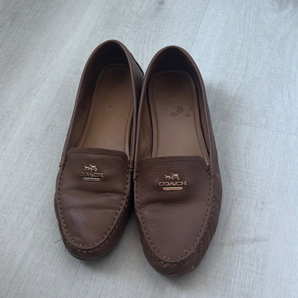 Well loved Coach loafers. Significant signs of wear at toes and heel.
